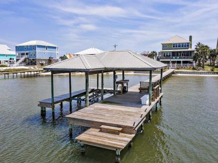 Private pier and boat dock at Sea Turtle Place vacation home in Gulf Shores