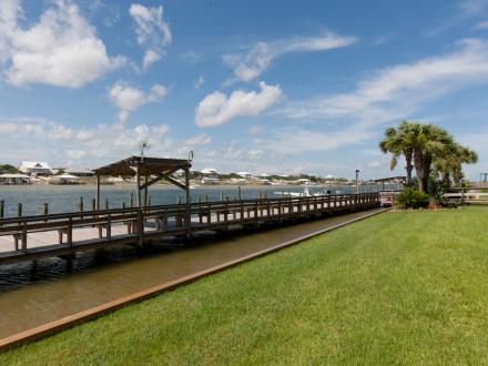 Pier and boat slips at Wind Drift waterfront condo in Orange Beach