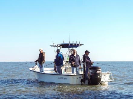 Anglers on an offshore fishing charter near the oil rigs in Gulf Shores