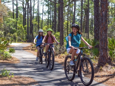 Children riding bikes in the Gulf State Park