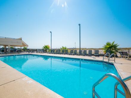 Outdoor, heated pool at Island Winds West Gulf-front beach condo
