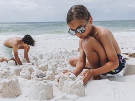 Kids building sandcastles 