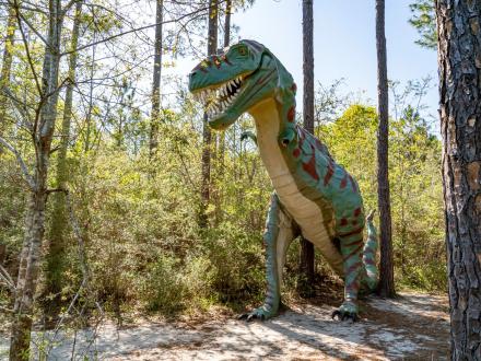 Dinosaurs in the woods at Barber Marina in Elberta