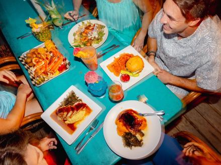 friends dining at GTs on the Bay waterfront restaurant in Orange Beach