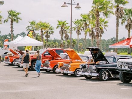 Cars lined up at The Wharf for Bama Coast Cruisin' Car Show in Orange Beach