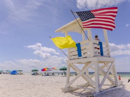 Lifeguard tower with beach flag at Gulf Shores beach