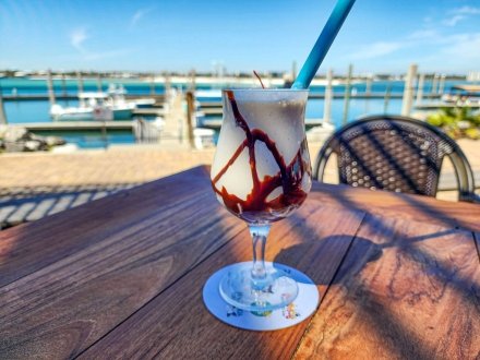 Bushwacker cocktail at Cobalt waterfront seafood restaurant in Orange Beach