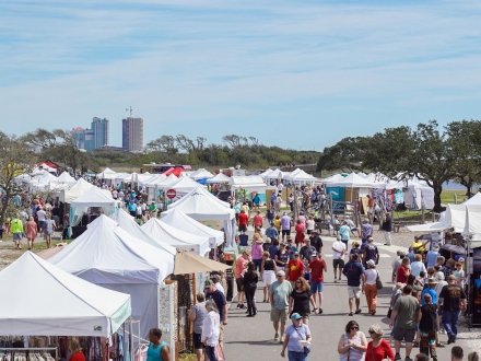 Aerial view of crowd and vendor booths at Ballyhoo Festival at Lake Shelby in Gulf Shores