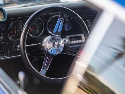wheel of a classic car on display at the Orange Beach Seafood Fest & Car Show at The Wharf