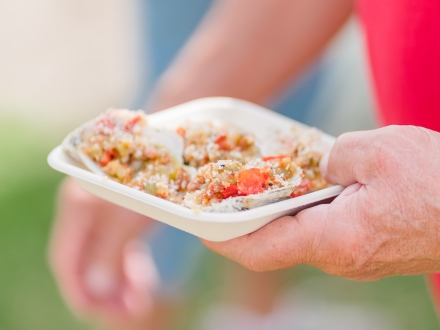 Fresh chargrilled oysters topped with parmesan at the Fort Morgan Oyster Fest