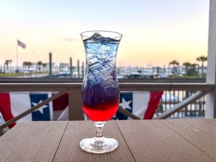 Mermaid Refresher mocktail drink at Barometer Waterfront Grille seafood restaurant in Orange Beach