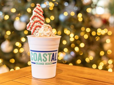 Christmas Tree Cake bushwacker cocktail at Coastal beachfront seafood restaurant in Orange Beach