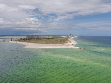 aerial view of The Pass public beach access in Orange Beach