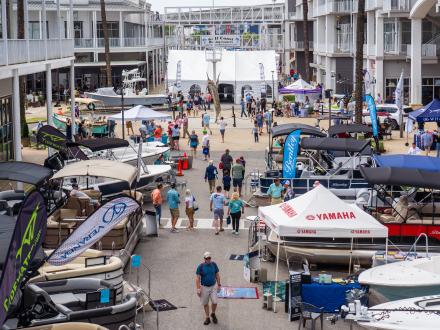 Vendors and vessels at the Wharf Boat & Yacht Show in Orange Beach