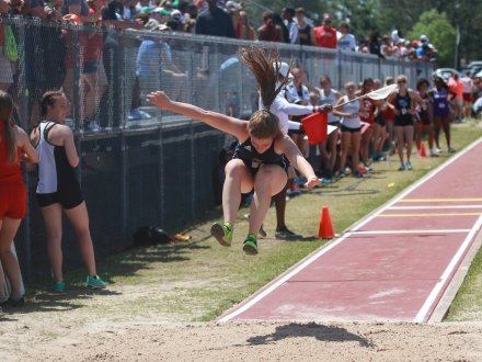 Jumping athletes during the AHSSA State Track & Field Championship on Alabama's Beaches