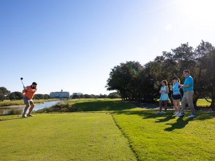 Friends golfing at Kiva Dunes Golf Resort in Fort Morgan
