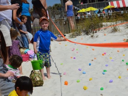 Young kids at Flora-Bama's Annual Easter Egg Hunt on the beach