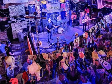 Crowd listening to live music at Flora-Bama Lounge & Oyster Bar in Orange Beach