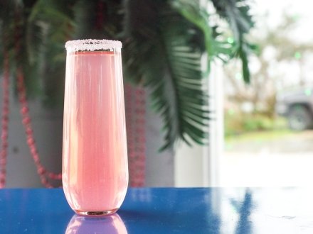 Specialty pink flamingo mimosa cocktail at High Tide Daiquiris & Mimosas in Gulf Shores