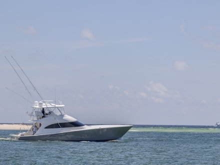 Large yacht heading out into Gulf from Perdido Pass in Orange Beach
