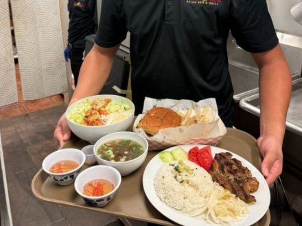 Platter full of food at Pho Mo Asian Kitchen & Grill restaurant in Gulf Shores