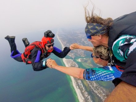 People skydiving over Orange Beach with Skydive the Gulf