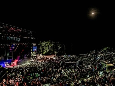 Open-air night concert at The Wharf Amphitheater in Orange Beach