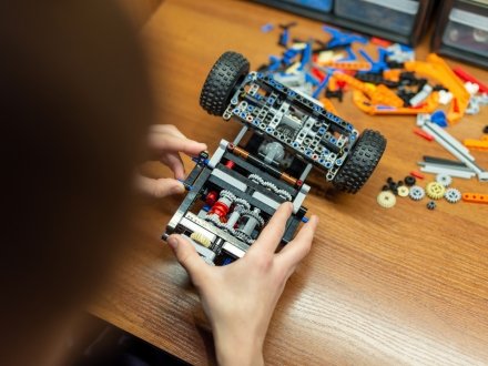 Kids building robots at robotics camp