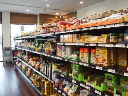 Shelves lined with specialty food at Gourmet World Market grocery store in Gulf Shores.