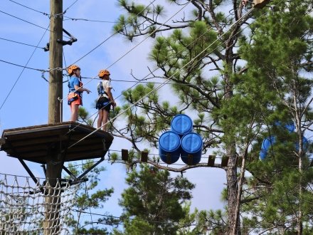 Kids on the ropes adventure course at the Gulf Coast Eco-Center in Gulf Shores.