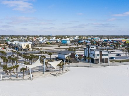 Aerial view off Gulf Place public beach and The Hangout restaurant in Gulf Shores