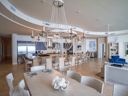Spacious and elegantly designed interior of a condo rental at Turquoise Place in Orange Beach, Alabama, featuring a large dining area