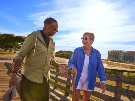 Snowbirds walking in the Gulf State Park on Alabama's Beaches