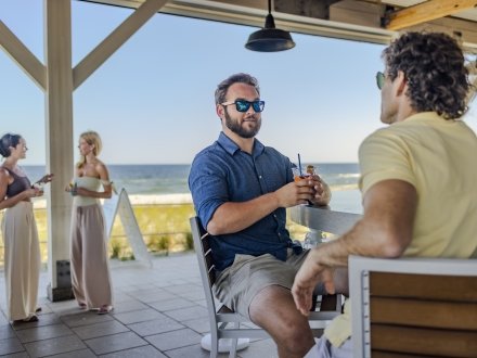 Meeting attendees enjoying a drink at CoastAL on Alabama's Beaches