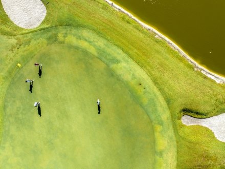 Group of friends golfing at Kiva Dunes Golf Resort in Fort Morgan