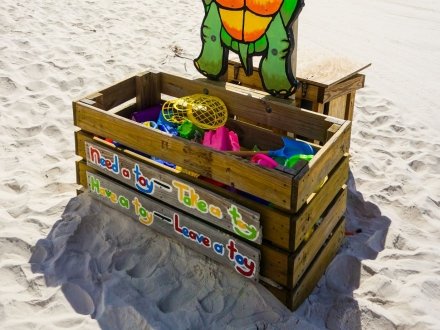 Take a toy, leave a toy box at beach in orange beach