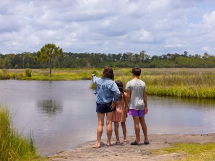 Family exploring Gulf State Park