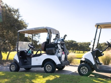 Golf carts on Kiva Dunes golf course in Fort Morgan