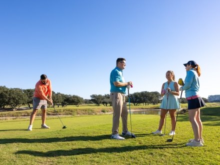 Friends golfing at Kiva Dunes Golf Resort in Fort Morgan