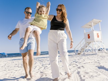 family enjoying their day on Alabama's Beaches.