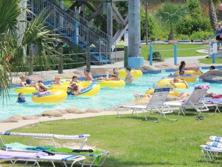 Visitors floating along the water at Waterville USA