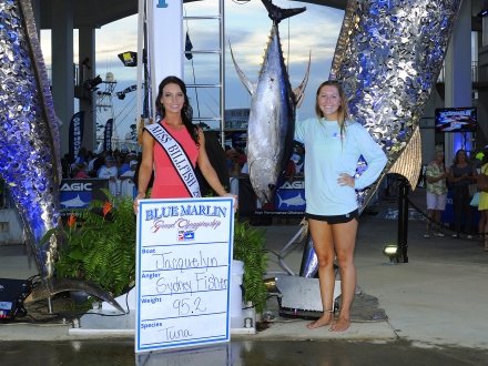 Female angler with her massive Tuna catch during the Blue Marlin Grand Championship