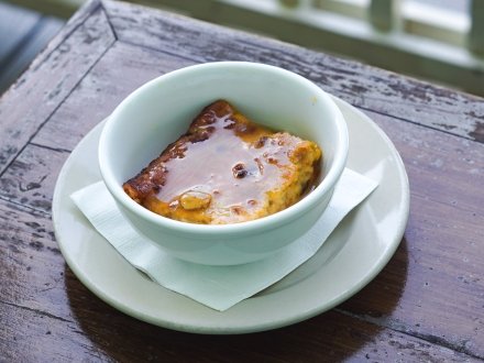 Bread pudding served with whisky sauce at Acme Oyster House in Gulf Shores