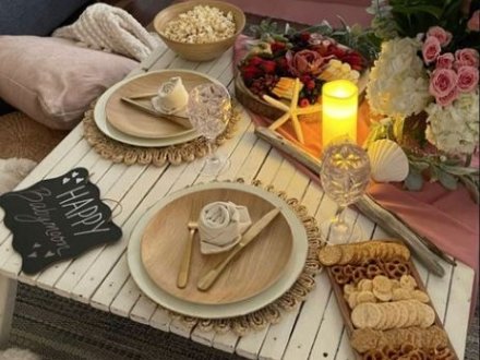 Indoor couple's picnic setup by Beach Moms in Gulf Shores