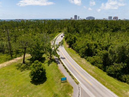 Aerial view of cars driving through Gulf State Park in Gulf Shores