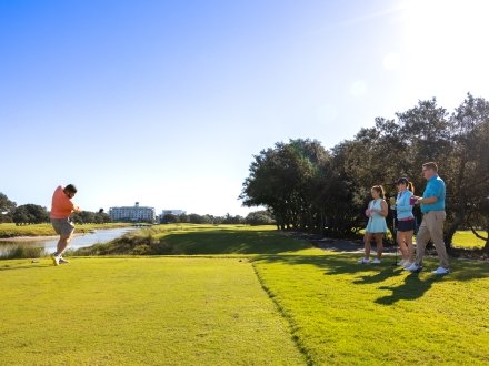 Friends golfing at Kiva Dunes Golf Resort in Fort Morgan