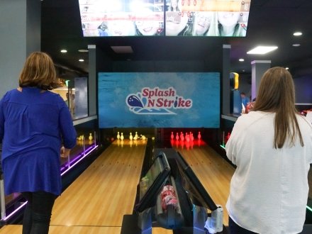 Friends bowling at the Waterville USA arcade in Gulf Shores