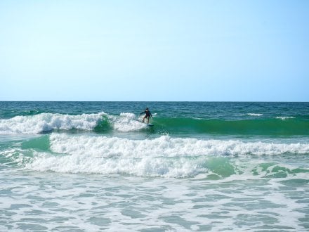 Man surfing in Gulf Shores
