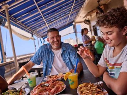 Family dining at Sea-N-Suds seafood restaurant in Gulf Shores