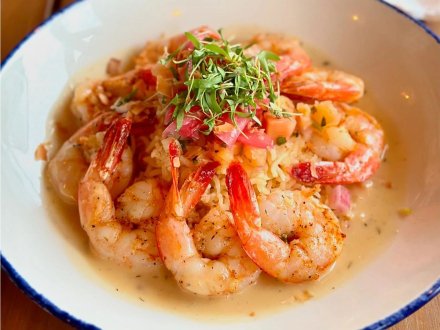 Tropical shrimp seafood dish at Coastal beachfront restaurant in Orange Beach